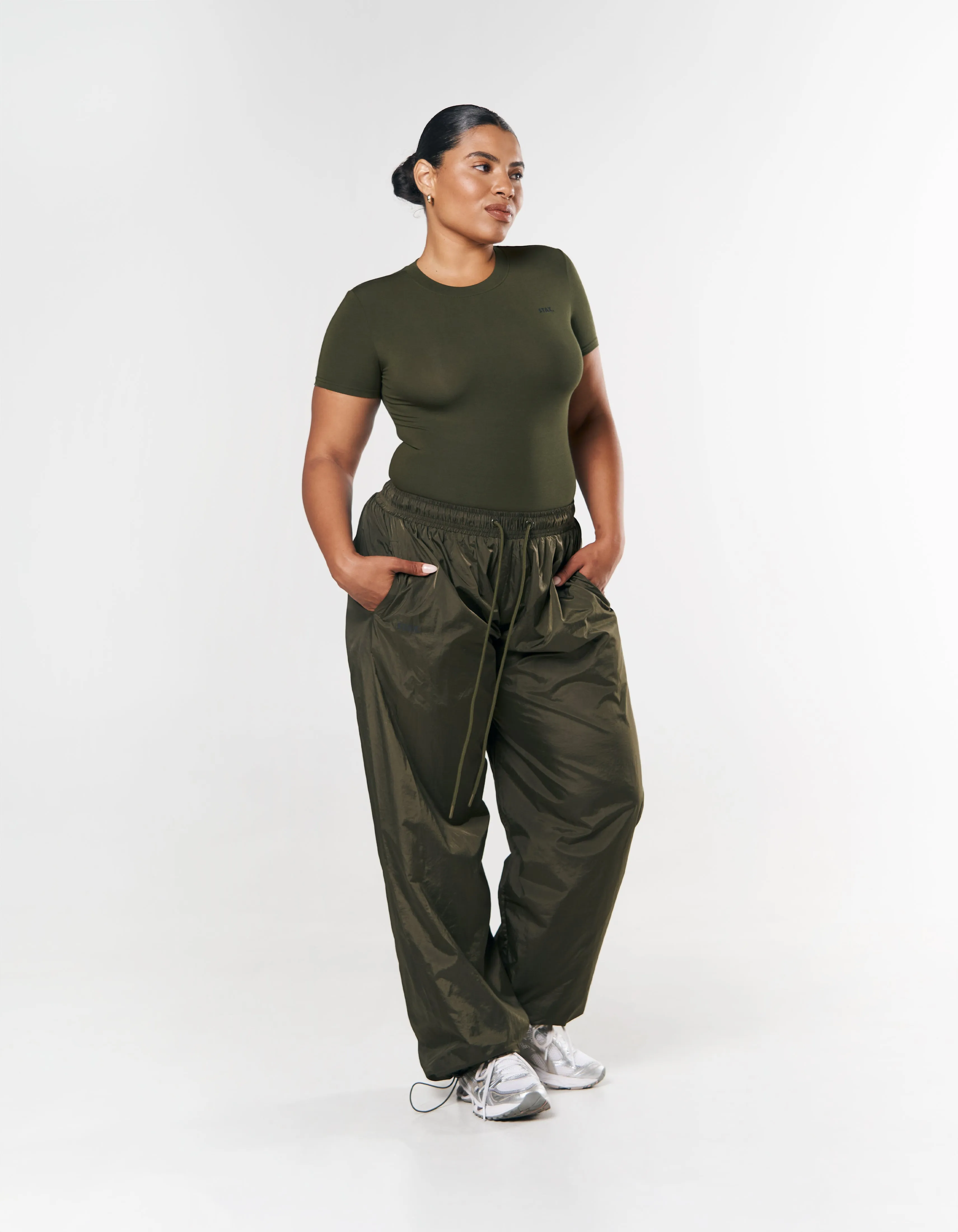 Certainly! Heres an optimized title for an e-commerce product:

Stylish Womens Khaki T-Shirt - Comfortable, Casual, and Perfect for Everyday Wear