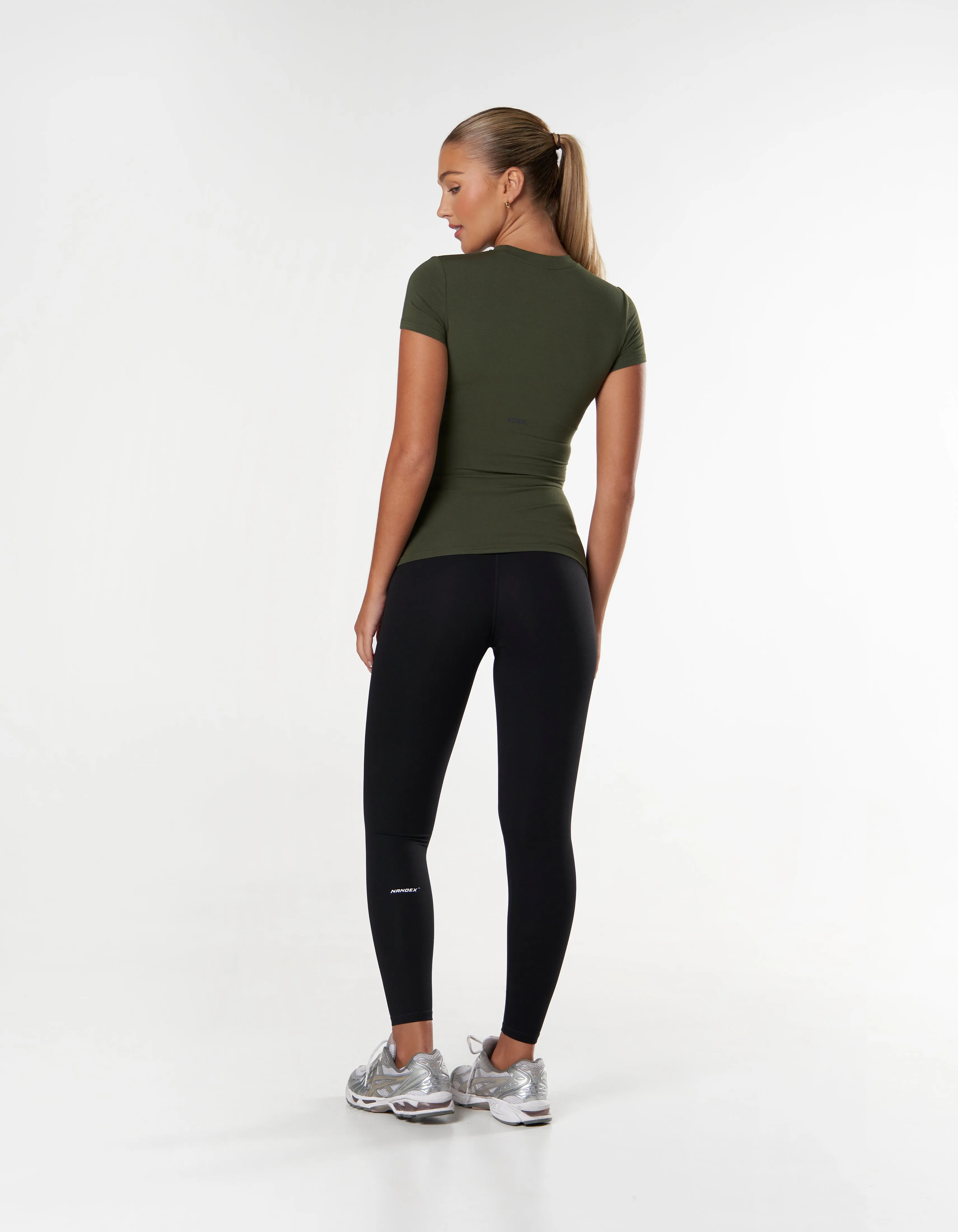 Certainly! Heres an optimized title for an e-commerce product:

Stylish Womens Khaki T-Shirt - Comfortable, Casual, and Perfect for Everyday Wear