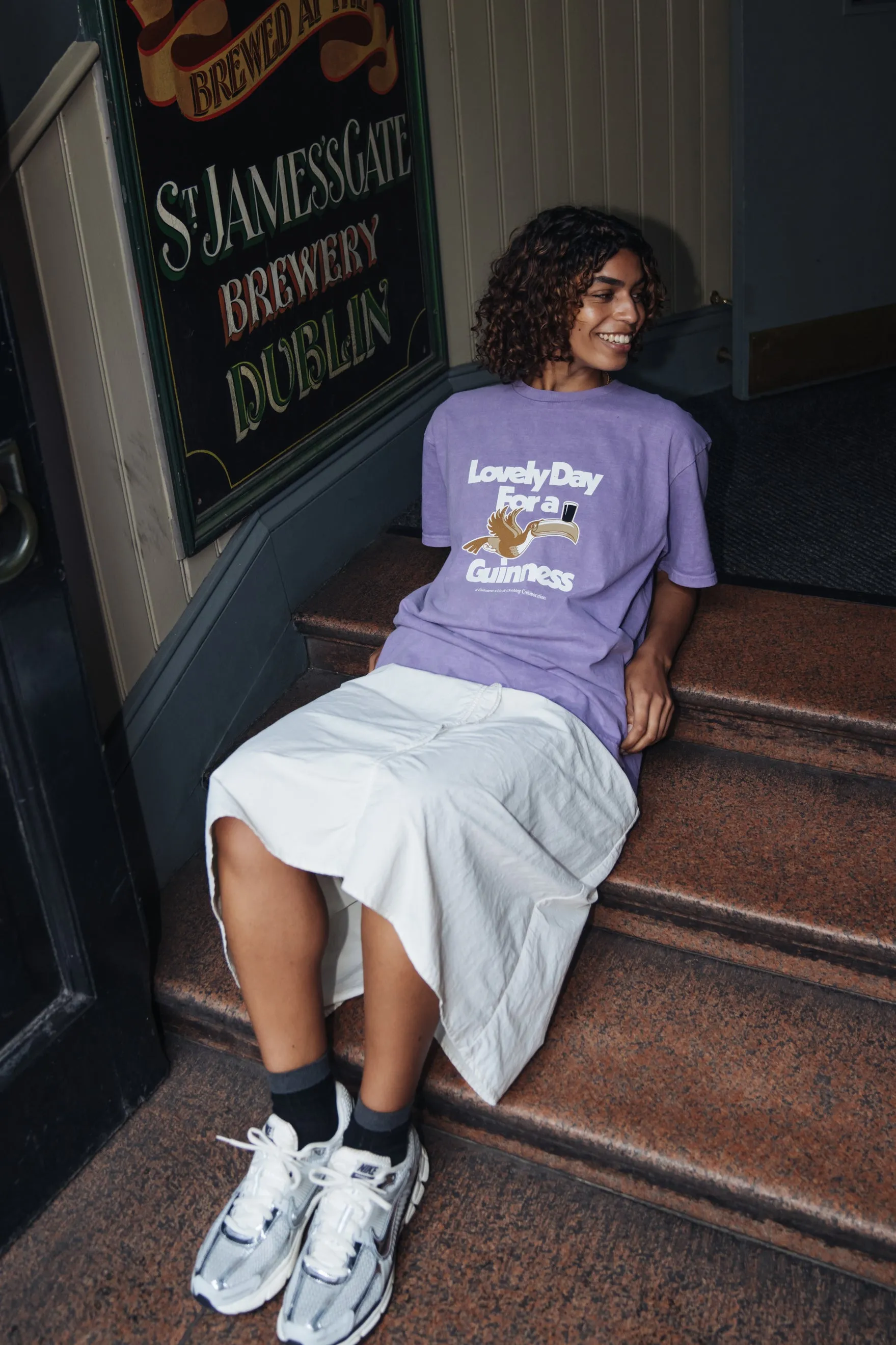 Guinness x UN:IK 'Lovely Day' Vintage Washed Tee - Purple