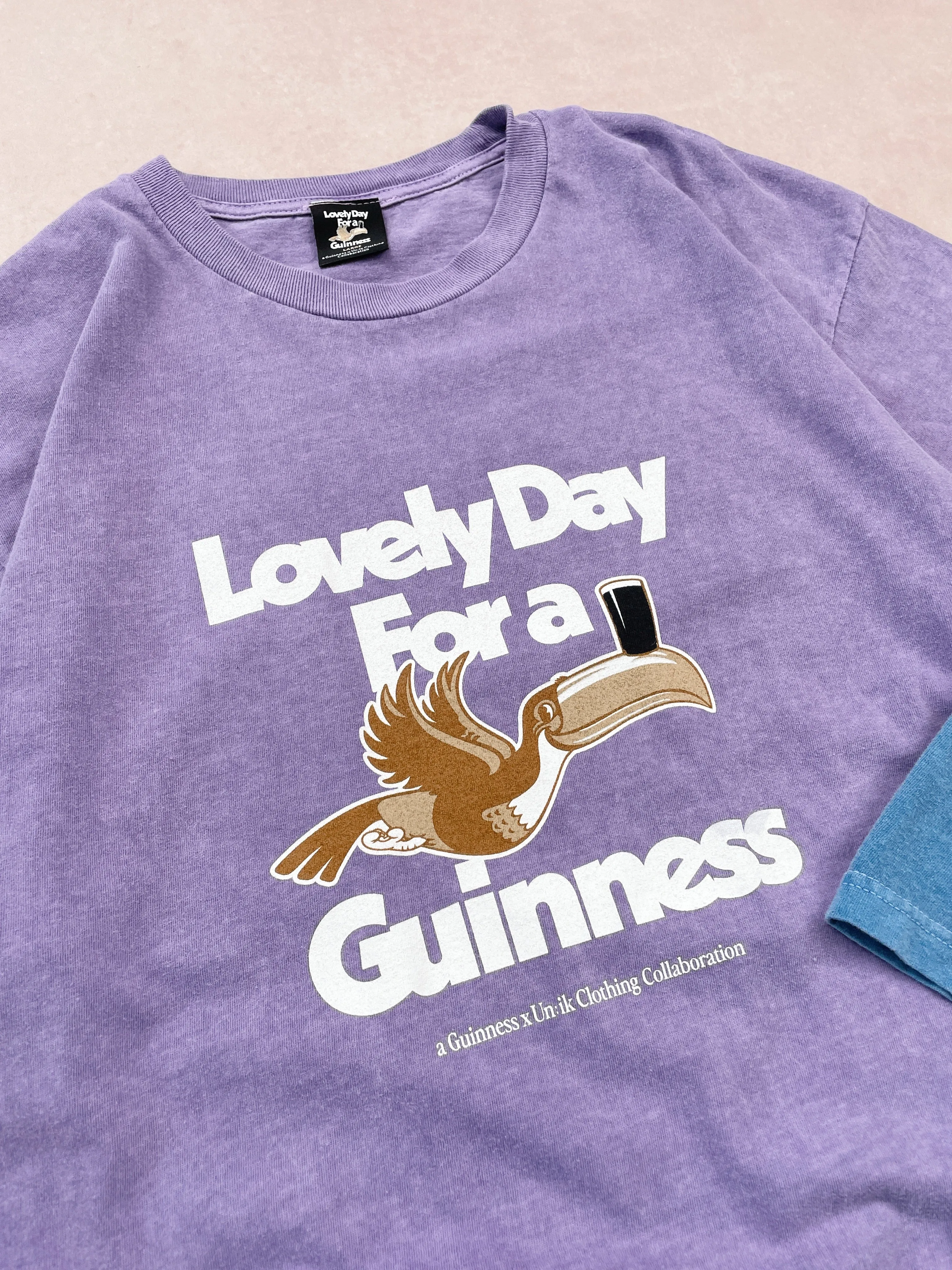 Guinness x UN:IK 'Lovely Day' Vintage Washed Tee - Purple