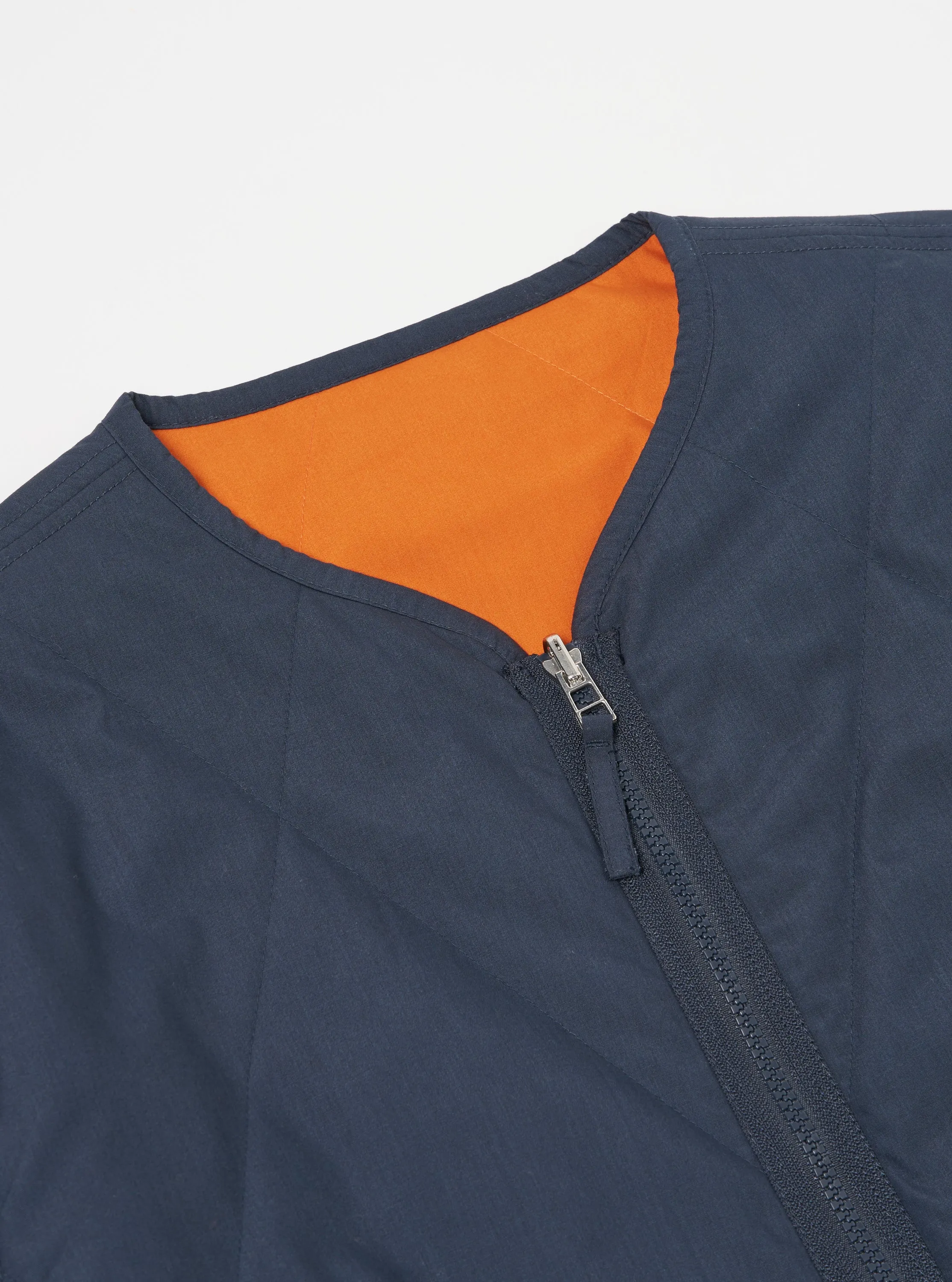 Universal Works Reversible Military Liner Jacket in Navy/Orange Recycled Polytech